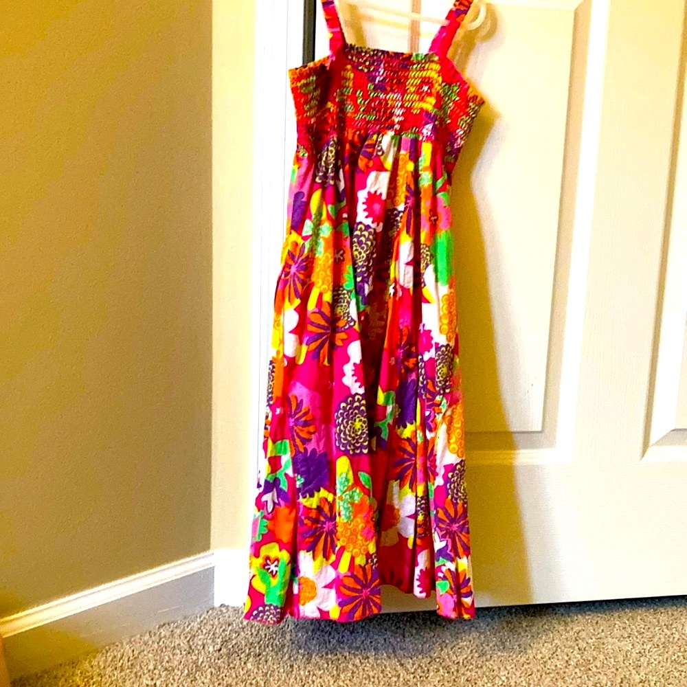 Lego summer midi sun dress with smocked upper detail. Beautiful floral print.